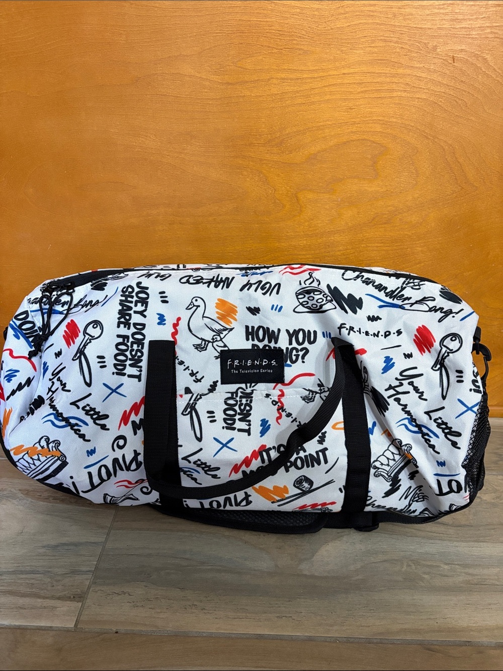 FRIENDS White Graphic Duffle with Multicolor Sketch Prints